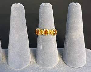 14K Gold Ring with Three Main Orange Gemstones with Orange and Clear Accent Stones