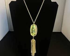 Kendra Scott Iridescent  Maybe Abalone  Pendant Necklace with Gold Tassel Chain 32 in.