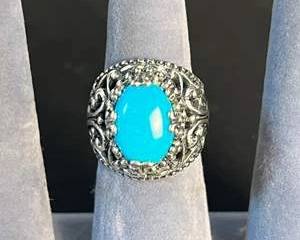 Intricately Designed Silver Color Ring with Oval Turquoise Colored Stone