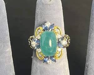 Sterling Silver Ring with Central Green Stone and Blue and Clear Accent Gemstones