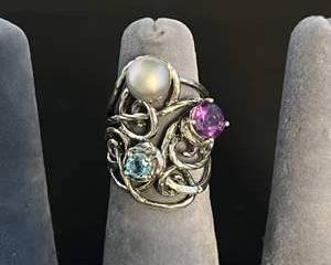 Sterling Silver Ring with Pearl, Purple Maybe Amethyst, and Blue Maybe Topaz Colored Gemstones