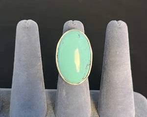 Sterling Silver Ring with Large Oval Turquoise Colored Stone