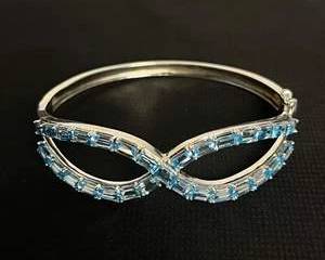 Sterling Silver Blue Maybe Topaz Infinity Bangle Bracelet