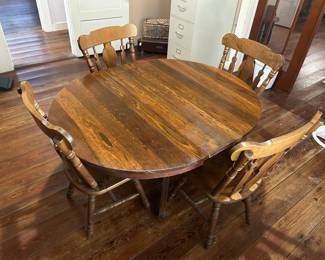 Antique Dining Table & Chairs Beautiful condition for its age. Has original caster wheels Has 1 leaf 42” x 42” (without leaf), 52” (with leaf) x 29” tall Pickup in Schulenberg between Main and Summit Must be able to move and load yourself.