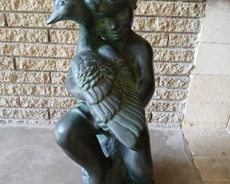 Boy and bird molded resin