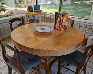 Oak table and mahogany chairs