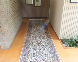 Nain-style runner with floral motif