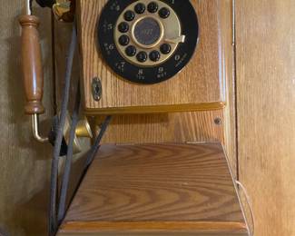 Thomas Collector's Edition 1927 replica wooden wall telephone featuring a rotary dial and gold colored bells
