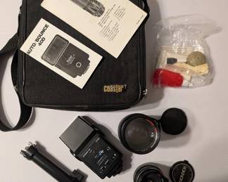 Vintage photography kit includes a bouncemaster branded bag containing a vivitar flash and a canon-compatible flash