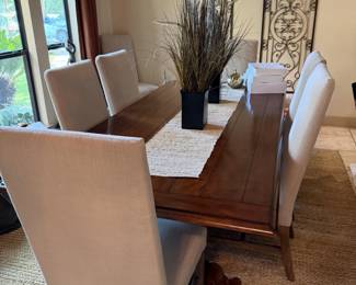 Dining set includes 8 chairs. 