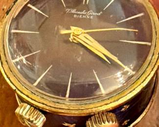 VINTAGE BUECHE GIROD "BIENNE" SUBMINIATURE MECHANICAL TRAVEL ALARM CLOCK FROM SWITZERLAND.