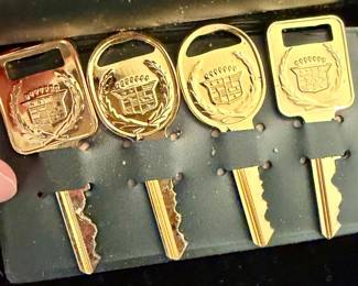 VINTAGE CADILLAC KEYS LIKE NEW IN CASE.