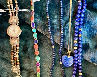 PEYOTE WATCH, LAPIS AND GOLD NECKLACES.