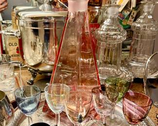 LOVE THIS COLORED GLASS DECANTER SET.