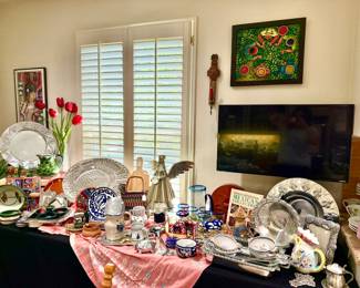 MEXICAN AREA WITH PEWTER PLATTERS AND GLASSWARE.