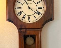 Unique clock which needs work, but the wooden case is simplistic and ready to be revamped.