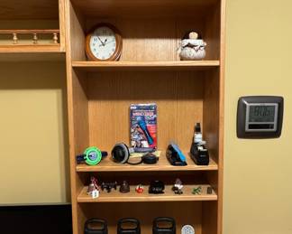 Assorted Desk Items: Calculators, Lamps, Digital Camera, Smart Watch, and Desk Accessories