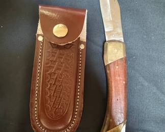 Buck 110 Folding Hunter Knife with Leather Sheath