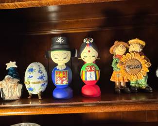 Assorted Decorative Figurines and Bowls, including Kokeshi Dolls and Repoussé Metal Bowls