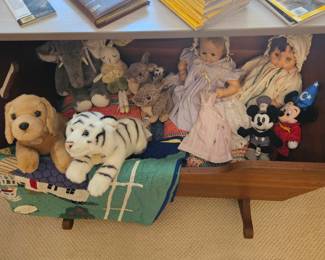 Various vintage dolls and stuffed animals