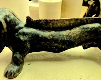 Much cast iron collectibles. Cast iron dachshund boot scraper