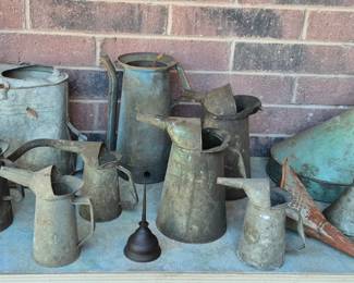 Rustic water and oil cans