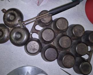 Cast iron donut mold and Griswold Puritan muffin pan