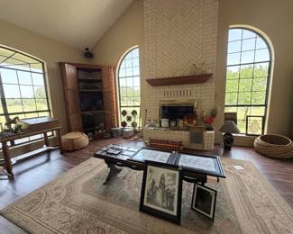 Antique desk, coffee table, baskets, etc
