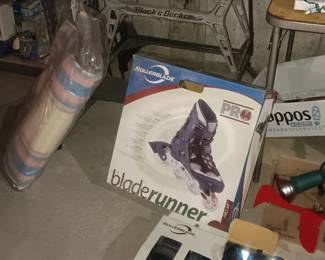 new in box roller blades and pad set, Black & Decker saw stand