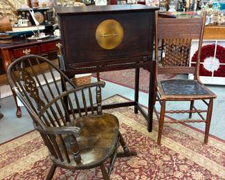 Mid 20th century vintage bow back colonial, Windsor rocking chair, pressed back leather chair with spindles, drop front Asian influence desk with pullout braces, and cubbies