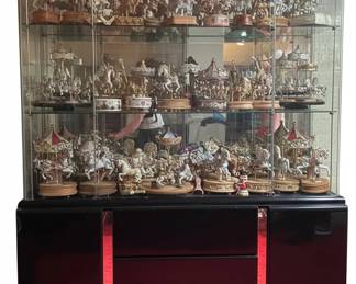 Collection of Swarovski Crystal Carousel Miniatures and Display Cabinets