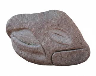 Carved Stone Face Sculpture