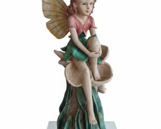 Fairy Figurine Holding Egg