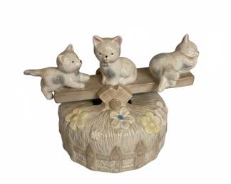 Ceramic Kitten Figurine on a Well