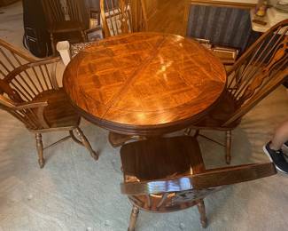 Dining table with six chairs and two leaves