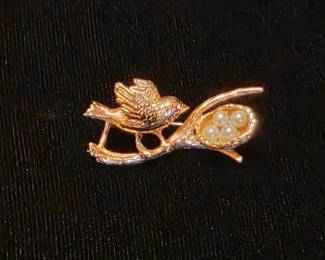 Unique custom made 14K pin.