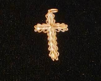 Unique 14K pendant. One of several crosses in this sale