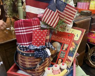Americana vignette featuring red white and blue cook books, napkins and more