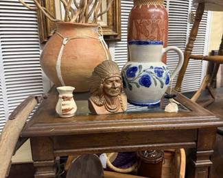 Solid wood side table with glass insert, pottery pieces, Native American bust