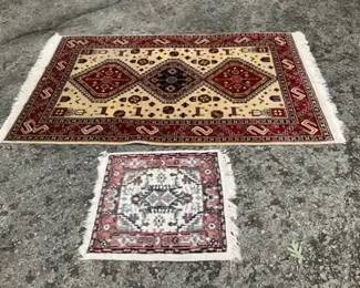 Two Fringed Accent Rugs
