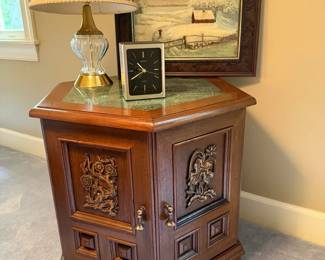 Carved Cabinet with Marble Top Lamp Clock and Winter Landscape