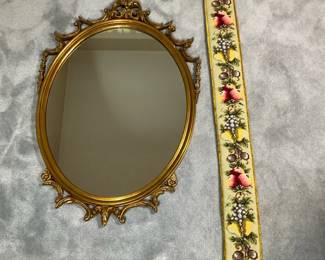 Ornate Gold Tone Wall Mirror with Needlepoint Wall Hanging