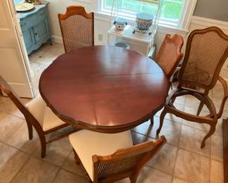 Oval Dining Table with 5 Cane Back Chairs