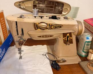 singer sewing machine in cabinet 