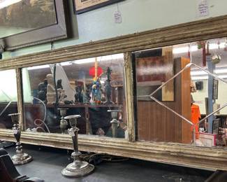 Classic Three Panel Glass Fram with electrified red candelabras on endss