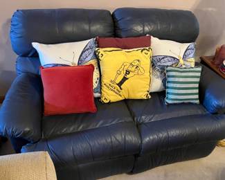Blue leather loveseat