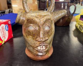 Signed face jug