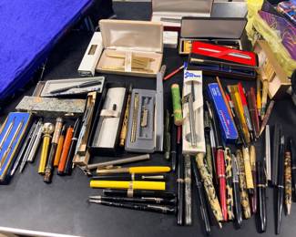 Huge collection of writing instruments, including two mechanical pencils from Benny Goodman