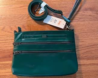 C107 - $20. Lug Convertible Cross Body Bag. Waltz-Wickedly Green. Measures 11.25" x 7.5".