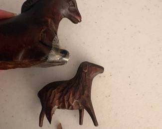 C65 - $60. Carved wood nativity from South Korea. 15pc. Lamb & Donkey need easy repairs. Measures 12" tall. 3 sheep were added but very similar wood.